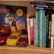 Illustration for article titled Surprise Saturday - 1:18s on a bookshelf